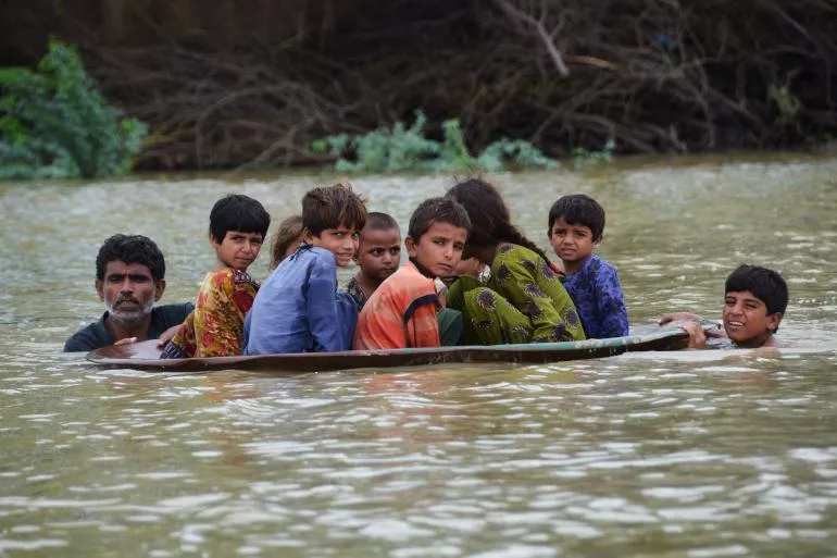 Pakistani family receiving aid